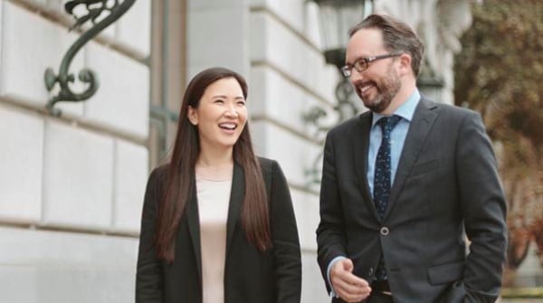Eun Sun Kim and Director Matthew Shilvock are standing outside of the War Memorial House